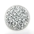 Detailed view of white acrylic alphabet beads in a transparent container for DIY crafts. - 4*7mm / White Base Black Font