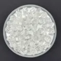 Close-up detail of clear acrylic faceted rhombus lantern loose beads for DIY jewelry crafts. - 10mm / White