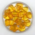 Detailed closeup of 20mm acrylic heart beads with horizontal holes, ideal for DIY jewelry making. - Transparent Orange