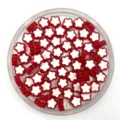 Red and white acrylic flower beads detail closeup, ideal for DIY jewelry making spacer - Red