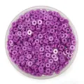 Close-up detail of purple polymer clay spacer beads, flat round DIY accessory for phone cases. - 6*1.3mm / Purple