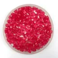 Close-up of pink transparent acrylic ice cube beads with holes, perfect for DIY and decor. - Rose Red