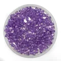 Detailed close-up of purple acrylic bicone beads for DIY jewelry making and curtain crafting. - 6mm / Purple