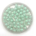 Perles rondes transparentes vue detail design interieur pour fabrication de bijoux DIY. - 8mm / Bleu clair