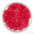 Detail view of 6mm pink translucent heart-shaped plastic beads in a clear tray for DIY crafts. - Transparent Rose Red
