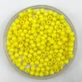 Yellow faceted acrylic round beads, perfect for DIY jewelry making and craft projects. Detail view. - 6mm / Yellow