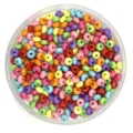 Detailed top view of colorful 6mm faceted acrylic wheel beads in a clear tray for DIY crafts. - Solid Mixed Colors