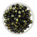 Black round flat alphabet beads with gold embossed letters, ideal for DIY jewelry making. - Black With Gold Text