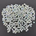 Close-up of iridescent star acrylic loose beads, perfect for DIY jewelry making details. - 6mm / Transparent White AB Color