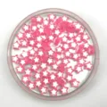 Close-up of pink acrylic star beads for DIY jewelry making accessories, transparent design. - Pink