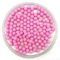 Close-up detail of solid pink acrylic round beads, smooth surface for DIY craft projects. - 6mm / Pink