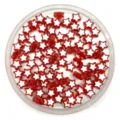 Close-up detail of red and white star-shaped acrylic loose beads for DIY jewelry making. - Red