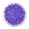 Close-up detail of solid purple round plastic acrylic beads and toy marbles in clear tray. - 6mm / Purple