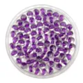 Detailed view of transparent acrylic beads with purple inner core for DIY jewelry making. - 8mm / Purple