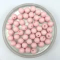 Detailed view of 8mm pink acrylic textured dot beads, perfect for DIY jewelry and crafts. - 8mm / Pink