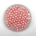 Close-up of pink transparent acrylic faceted earth beads, perfect for DIY jewelry making crafts. - 8mm / Pink