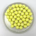 Close-up details of 8mm yellow acrylic bayberry beads with dotted stripe texture for DIY jewelry. - 8mm / Yellow