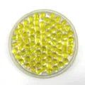 Close-up view of yellow inner-core transparent acrylic beads neatly arranged in a clear tray detail. - 8mm / Yellow