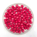 Close-up of vibrant pink faceted acrylic beads, perfect for DIY jewelry making and crafts. - 6mm / Rose Red