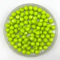 Detailed view of bright green faceted acrylic loose beads in a clear tray for DIY jewelry making. - 6mm / Grass Green