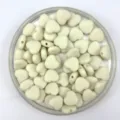 Detailed view of matte acrylic heart loose beads showing smooth surface and straight hole design. - 12mm / Off White
