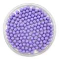 Close-up detail shot of solid purple round plastic craft beads displayed inside a clear tray. - 6mm / Light Purple