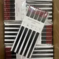 Set bacchette in lega con design perle rosse, lavabile in lavastoviglie per uso quotidiano in cucina. - 23cm / Nero rosso