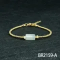 Gold beaded bracelet with central cylindrical stone and extension chain for elegant daily wear. - Aquamarine Style (BR2159-A)