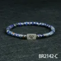 4mm blauwe steen kralenarmband met metalen afstandhouders en gegraveerde bedel voor herenmode. - Blauw Geaderde Steen (BR2142-C)