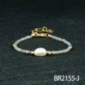 Minimalistische zoetwater parel armband met gouden metalen accenten en gefacetteerde kralen - Flits Grijs (BR2155-J)