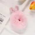 Soft pink plush bunny ear hair scrunchie detailed view, cute fuzzy hair tie accessory for women. - Pink