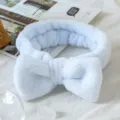 Light blue plush bow headband for face washing, soft coral fleece makeup hair band. - Blue