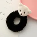Accessorio capelli con orsetto di peluche nero, elastico morbido e design grazioso. - Orso Bianco Nero