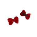 Close-up detail of the red velvet bow hair clip, showing soft texture and back metal clip. - 1# Velvet Red Bowknot Hair Clip