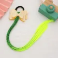 Kinderen glitter strik haarband met kleurrijke gevlochten touwen en neon haarverlengingen. - Geel