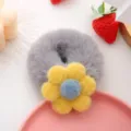 Cute grey plush hair scrunchie with yellow flower detail, soft fluffy winter hair accessory. - Gray Scrunchie + Yellow Flower
