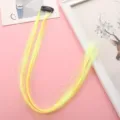 Vue détaillée de l'extension de cheveux tinsel PET jaune coloré avec clip pour la scène. - Style Clip BB (BB-Cheveux d'Ange Dorés) / Jaune Néon
