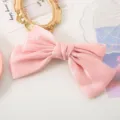 Pink satin bow hair clip detail view, featuring glossy fabric and elegant design for women. - Girl Pink