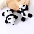 Detailed close-up shot of the cute plush panda hair clip, showing soft texture and secure clip back. - Lying Bear Hair Clips