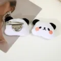 Close-up detail of cute plush panda hair clip with metal brooch pin, soft fluffy texture. - Panda Brooch Hairpin Version