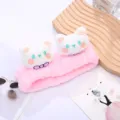 Detailed view of pink plush cat facial headband, soft fluffy fabric with cute cat ears and bow. - Style 6