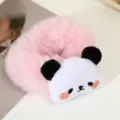 Close-up detail of a cute pink plush panda hair scrunchie, soft furry design, daily hair accessory. - Panda Hair Tie / Pink