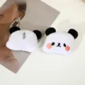 Cute panda plush hair accessory detail showcasing soft white fabric and embroidered face. - Panda Accessory (Back Opening)