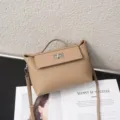 Detailed shot of women's premium leather top handle crossbody bag with classic design features. - 22*10*14CM / Elephant Gray