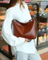 Detailed shot of the retro brown leather shoulder bag, highlighting texture and craft. - Length 26 Width 23 Thickness 9 / Coffee