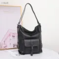 Sac à dos en cuir véritable pour femme, élégant sac porté épaule noir avec poche avant. - Noir