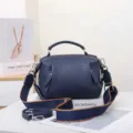Detail view of genuine leather women handbag, navy blue daily commute top handle shoulder bag. - 23*11*15cm / Sapphire Blue