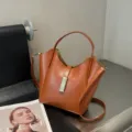 Retro minimalist brown leather bucket bag, large capacity fashion shoulder bag for women. - Caramel color