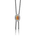Close-up of vintage oval bolo tie pendant with ornate silver filigree and polished center stone. - Orange