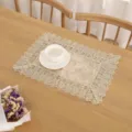 Detailed view of the elegant rectangular embroidered lace placemat with sheer mesh cutout. - 30*45 / Style 4